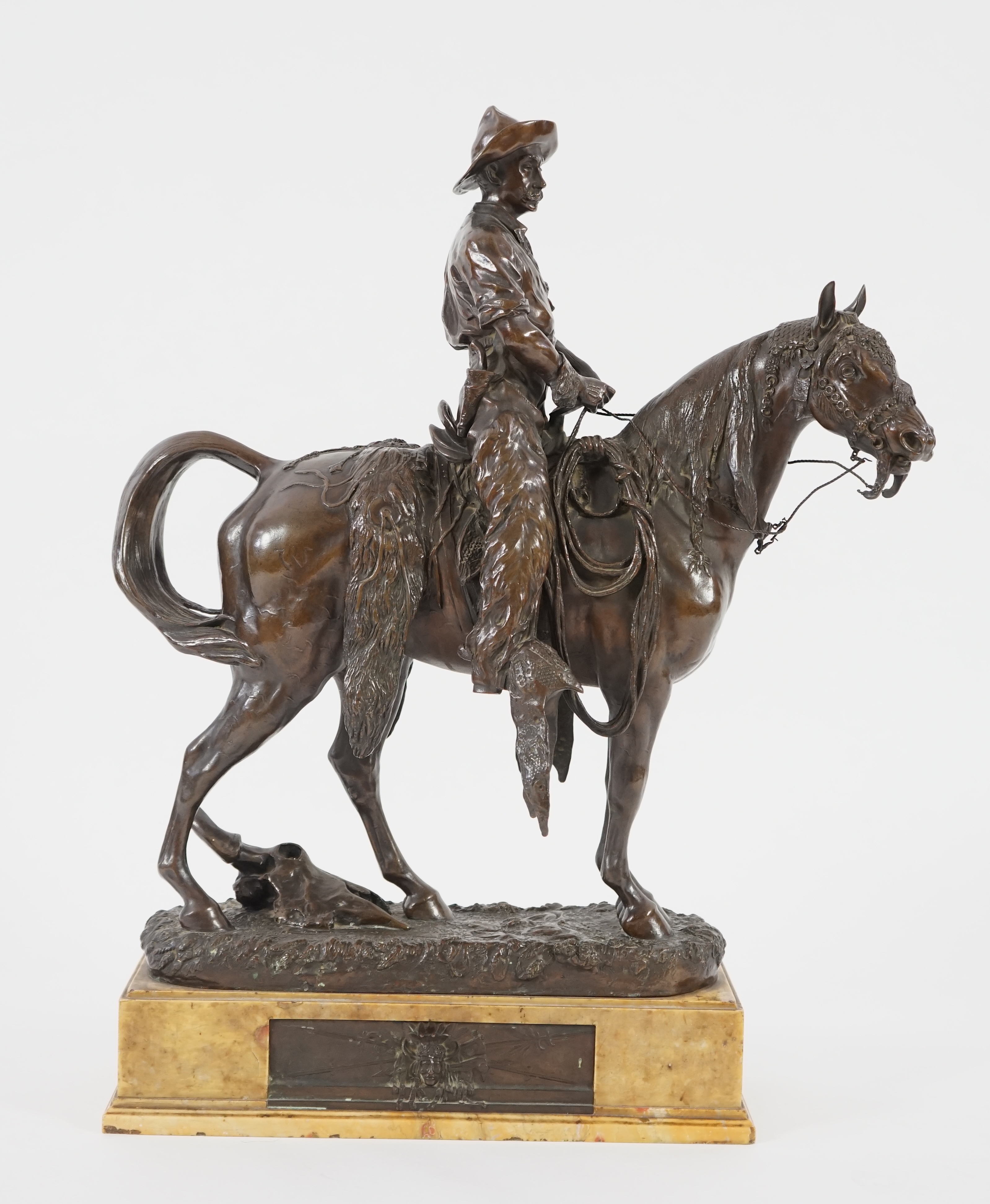 Walter Winans (St. Petersburg, 1852-Parsloe Park, Essex, 1920), a cast bronze of the artist, as a cowboy, riding the Arab stallion Skowronek, 50cm wide, 66cm high, overall 79.5cm high